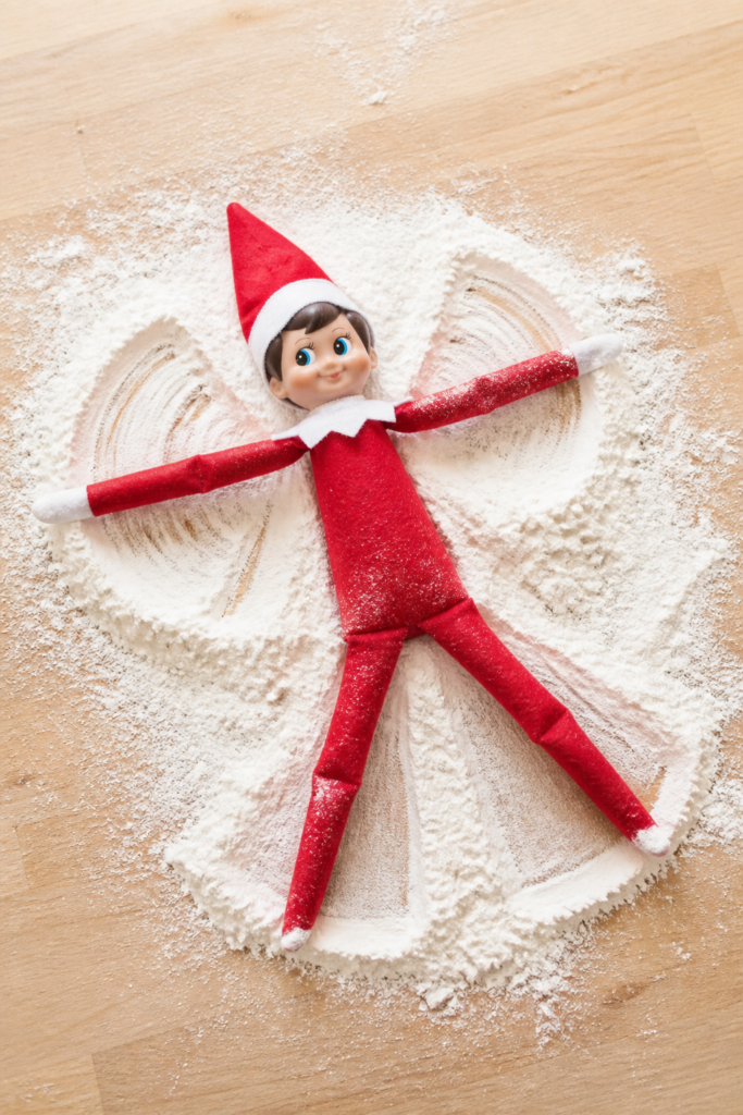 Elf Making Snow Angels